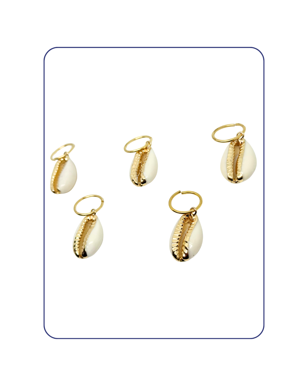Set of gold and shell earrings on a white background